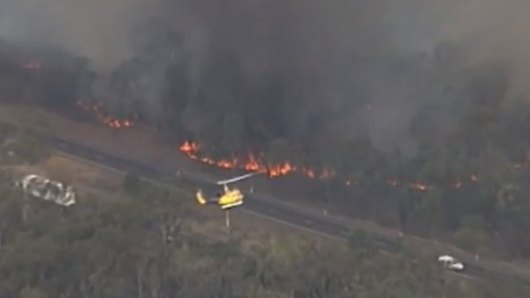 The bushfire forced the closure of the Warrego Highway in Grantham.