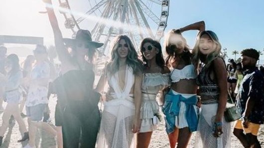 Bec posed alongside her army of glamorous WAGs including Nadia Bartel (second left), Lana Wilkinson and Jessie Murphy (far right) at the festival.   