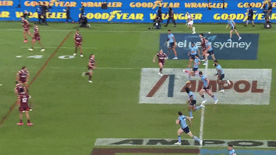 NSW Blues Liam Martin kick chase and tackle on Queensland Maroons Xavier Coates in State of Origin.