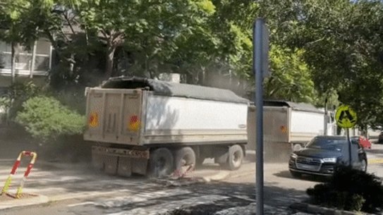 Footage of trucks constructing White City