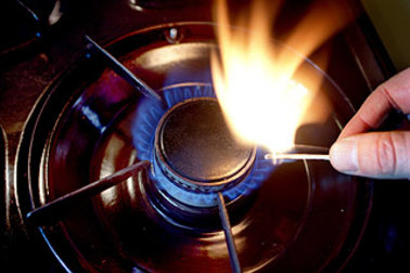 A gas stove is basically a well-contained and controlled fossil-fuelled open fire.