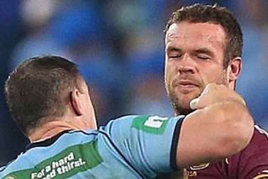 Nate Myles about to cop one from Paul Gallen in Origin