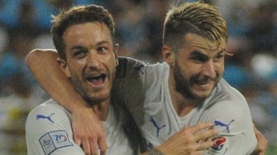 Adam Taggart celebrates with debutant Terry Antonis after the latter set up a goal for the former against Daegu last year.