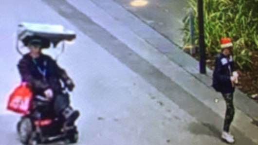 Police are hoping to identify a man after a wheelchair was stolen and a man left stranded in a toilet at Federation Square in Melbourne. 