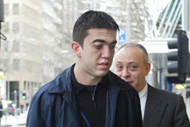 Faruk Orman outside court in 2004 with Steve Kaya.