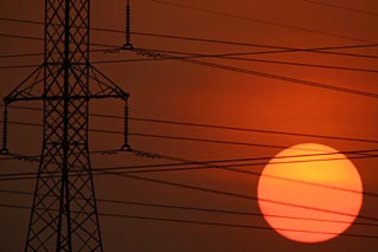 The operator of Australia's main power grid said extreme temperatures and bushfires pushed the system to the brink during the 2019-20 summer.