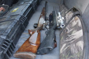 Some of the seven guns found in the back of a car being driven by the Mount Isa man.