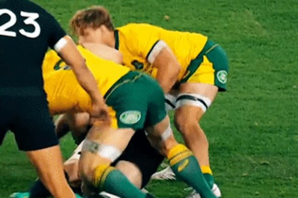 David Pocock wins the race to the ball.