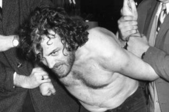 Singer Joe Cocker being arrested after his concert in Melbourne in 1974.