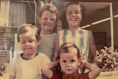 The Ryan family in the 1970s (clockwise from back left), Adam, Melissa, Scott and Paul.