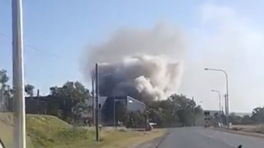 Rubbish on fire at Pinkenba near Brisbane Airport.
