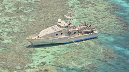 Defence Force patrol boat the Roebuck Bay gets stuck on the Great Barrier Reef off Port Douglas.