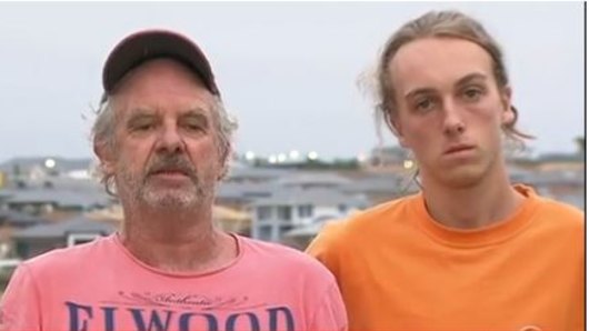 Andrew Clarke and his son Charlie in the days following the bushfire. 