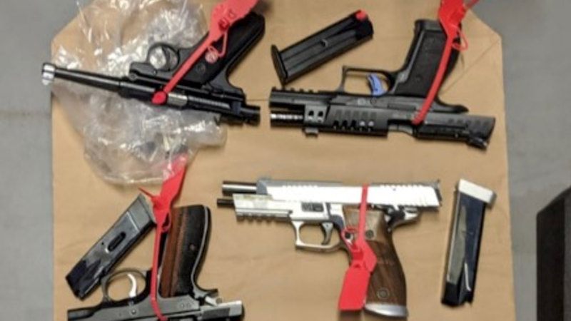 gun heist accused to remain behind bars