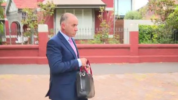 NAB CEO Andrew Thorburn heads to work on Tuesday morning.