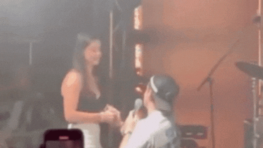 ‘Hurts to watch’: Wedding proposal at Brisbane gig turns awkward