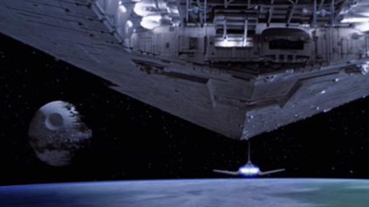 An Imperial Star Destroyer approaches the second Death Star in Return of the Jedi.