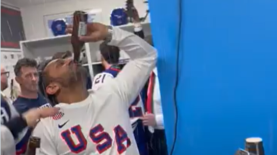 FBI director Kash Patel celebrating at the Winter Olympics.
