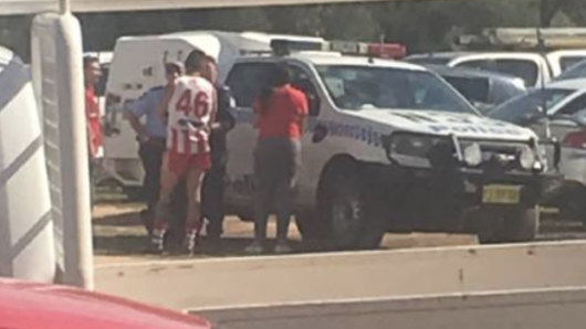 Jarrah Maksymow (Number 46) talking to police before Saturday's game.