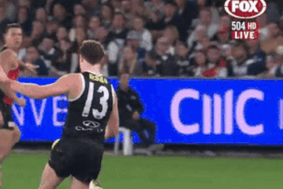 Geelong’s Patrick Dangerfield makes late contact on St Kilda’s Ryan Byrnes.