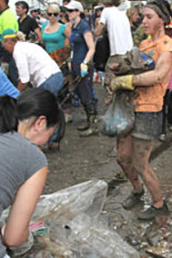 Brisbane's "mud army" at work after the floods.