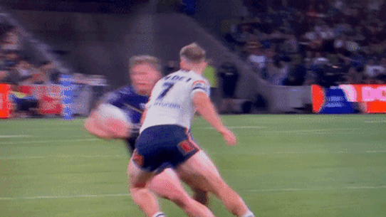 Cop that: Sam Walker avoids being penalised for this contentious shot on Harry Grant
