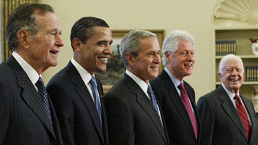From left: Former US presidents George HW Bush, Barack Obama, George W Bush, Bill Clinton and Jimmy Carter in the Oval Office in 2009.
