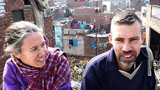 Mark and Cathy Delaney on the roof of their house in a Delhi slum in 2009
