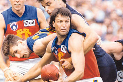 Paul Roos, pictured here playing for   Fitzroy in 1993, is a backer of the Brisbane Lions merger.