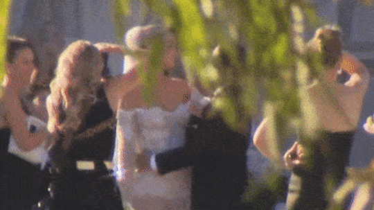 Sam Kerr and Kristie Mewis share a kiss after saying “I do” in Swan Valley on New Year’s Eve.