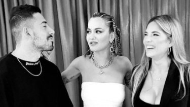 Jono Castano, Rita Ora and Amy Castano pictured in 2021.