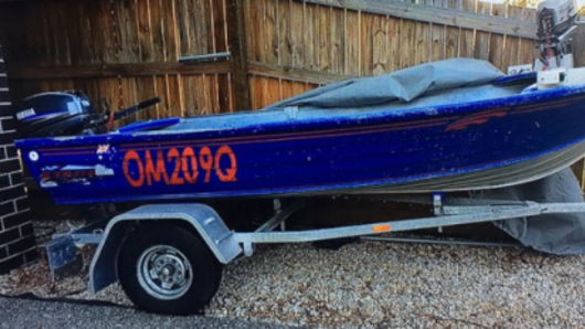 Water police and other agencies are searching for this boat in Moreton Bay, off Brisbane.