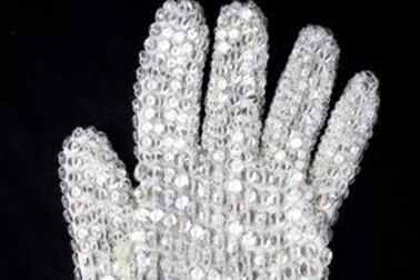 Michael Jackson's custom designed white spandex, right-hand glove completely covered in clear Swarovski crystal loch rosen crystals. Auction estimate: US$10,000 - $15,000.