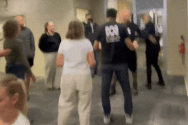 The meeting was interrupted, then devolved into chaos.