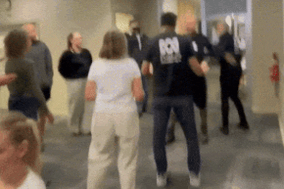 The meeting was interrupted, then devolved into chaos.