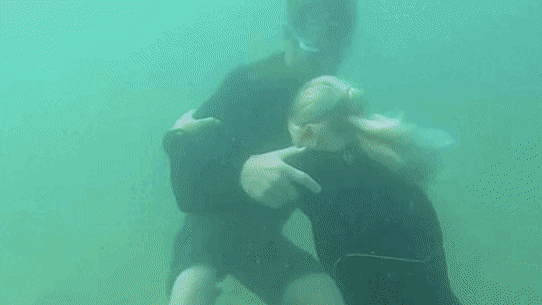 Molly Picklum wrestling underwater.