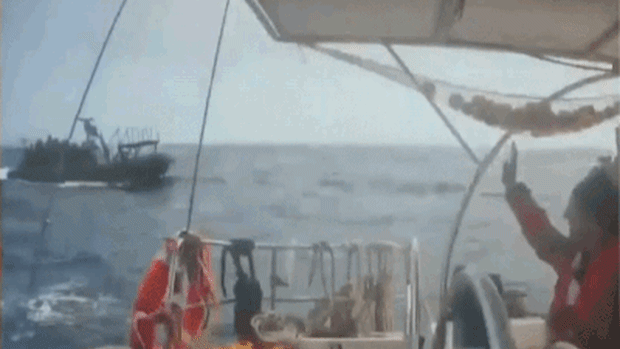 Israeli troops approach flotilla.