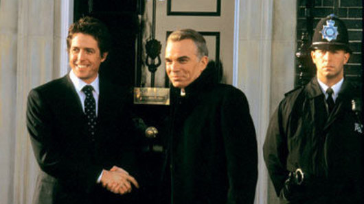 Tough love for an ally: A scene from Love Actually involving Hugh Grant as British PM and Billy Bob Thornton as US President. 