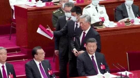 Former Chinese top leader Hu Jintao was unexpectedly led out of the closing ceremony of a major meeting of China’s ruling Communist Party on Saturday.