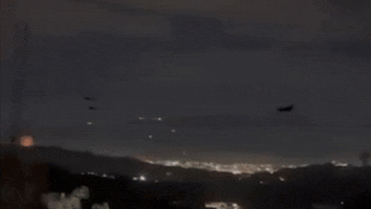 Helicopters are seen flying over Caracas after explosions rocked the city.