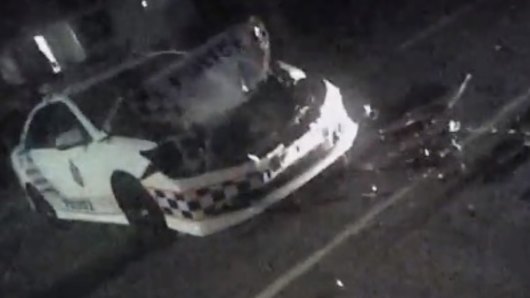 The police car was extensively damaged after being rammed four times in Deception Bay on Friday night.