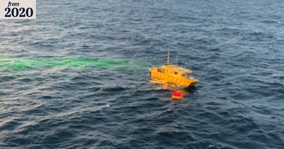 Two fishermen rescued from life raft after boat sinks off Queensland