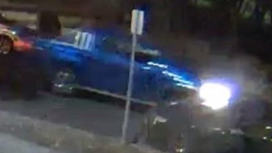 Police believe the men fled the car fire in a blue Holden Colorado ute