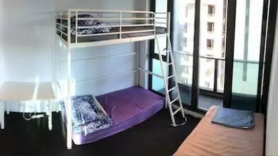 A bedroom with a bunk bed and single mattress currently being advertised on Gumtree on Spencer Street.