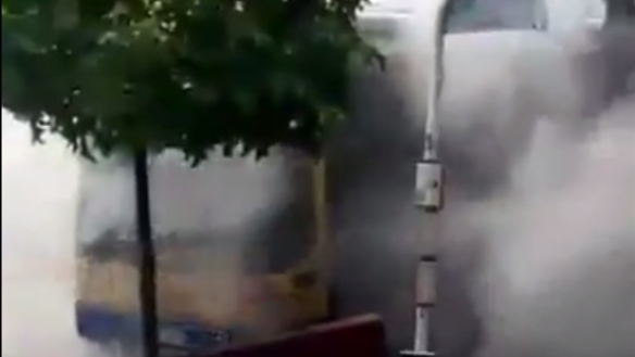 Smoke billowing from the bus at Moorooka.