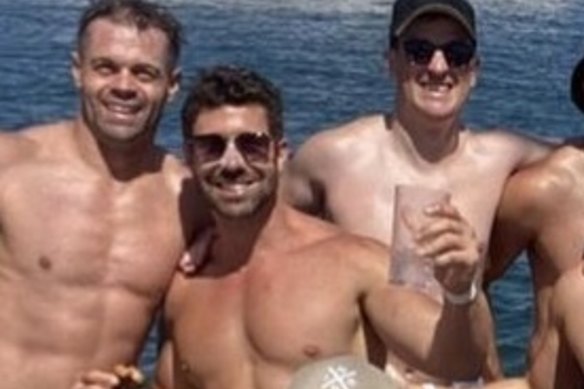Heston Russell, centre, on Sydney Harbour on January 2, the date of the alleged assault.