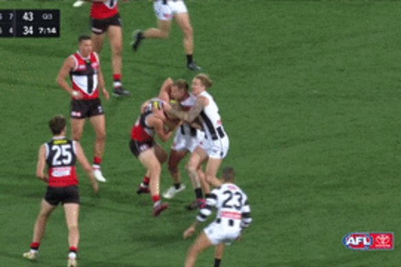 Sebastian Ross was “gang tackled” by three Collingwood opponents, including Taylor Adams.
