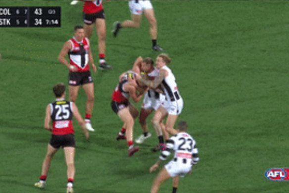 Sebastian Ross was “gang tackled” by three Collingwood opponents, including Taylor Adams.