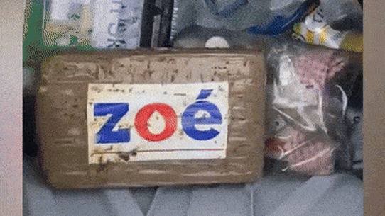 A lifesaver has filmed the moment he plucked a $200,000 brick of cocaine from the water off Bondi.