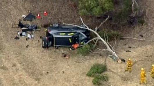 A woman has died and a baby is in hospital after a crash on a notorious stretch of road west of Melbourne.
